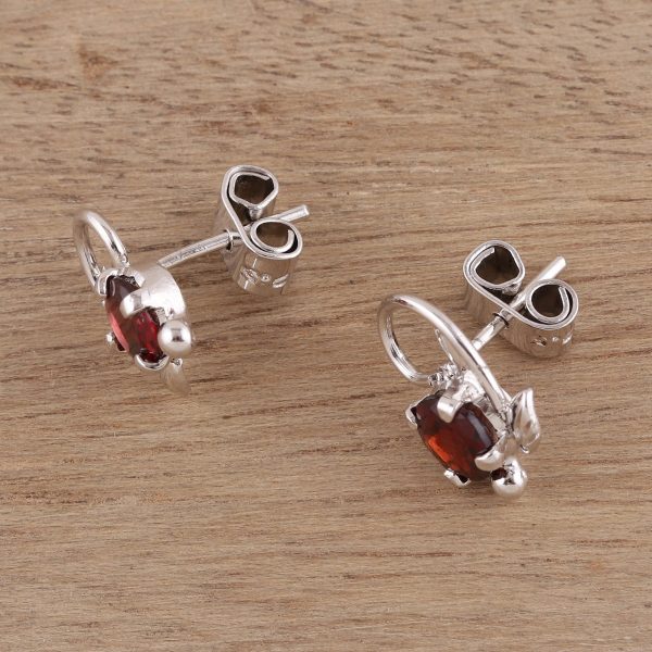 Blissful Radiance Leafy Rhodium Plated Garnet Stud Earrings from India Fashion